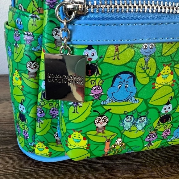 NWT Loungefly x Pixar It’s a Bugs Life all over bug print backpack - Picture 3 of 8